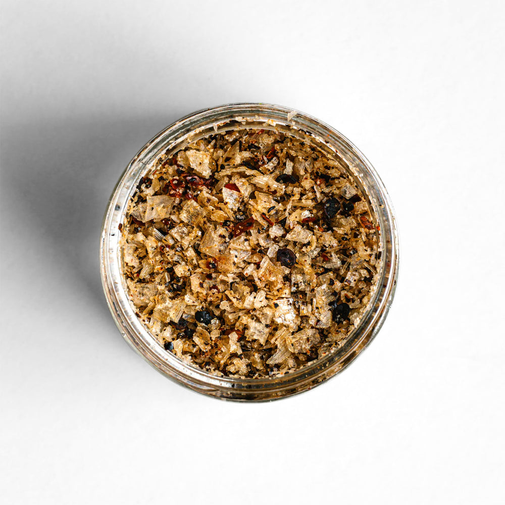 Top-down view of Campfire Salt, a blend with alder smoked Alaskan sea salt with a hint of heat.