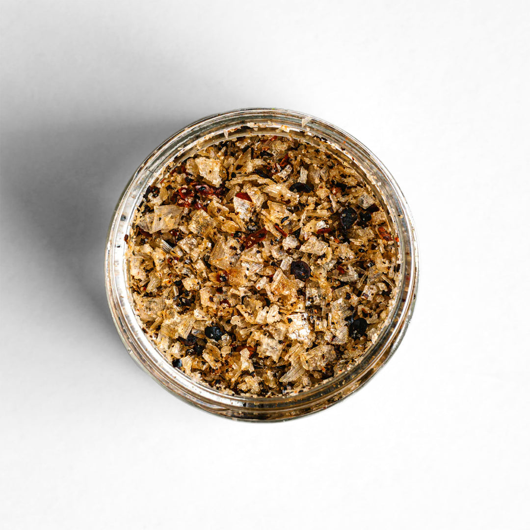 Top-down view of Campfire Salt, a blend with alder smoked Alaskan sea salt with a hint of heat.