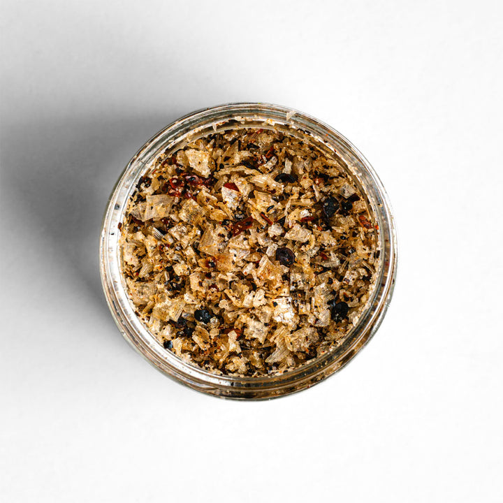 Top-down view of Campfire Salt, a blend with alder smoked Alaskan sea salt with a hint of heat.