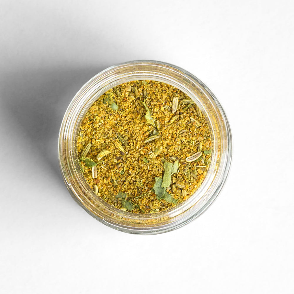 Top-down image of Vadouvan in a glass jar.