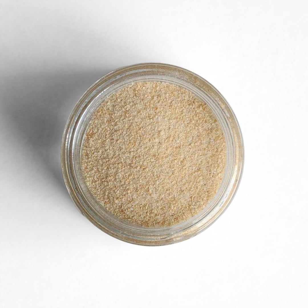 Top-down view of granulated garlic.