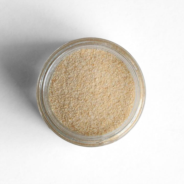 Top-down view of granulated garlic.