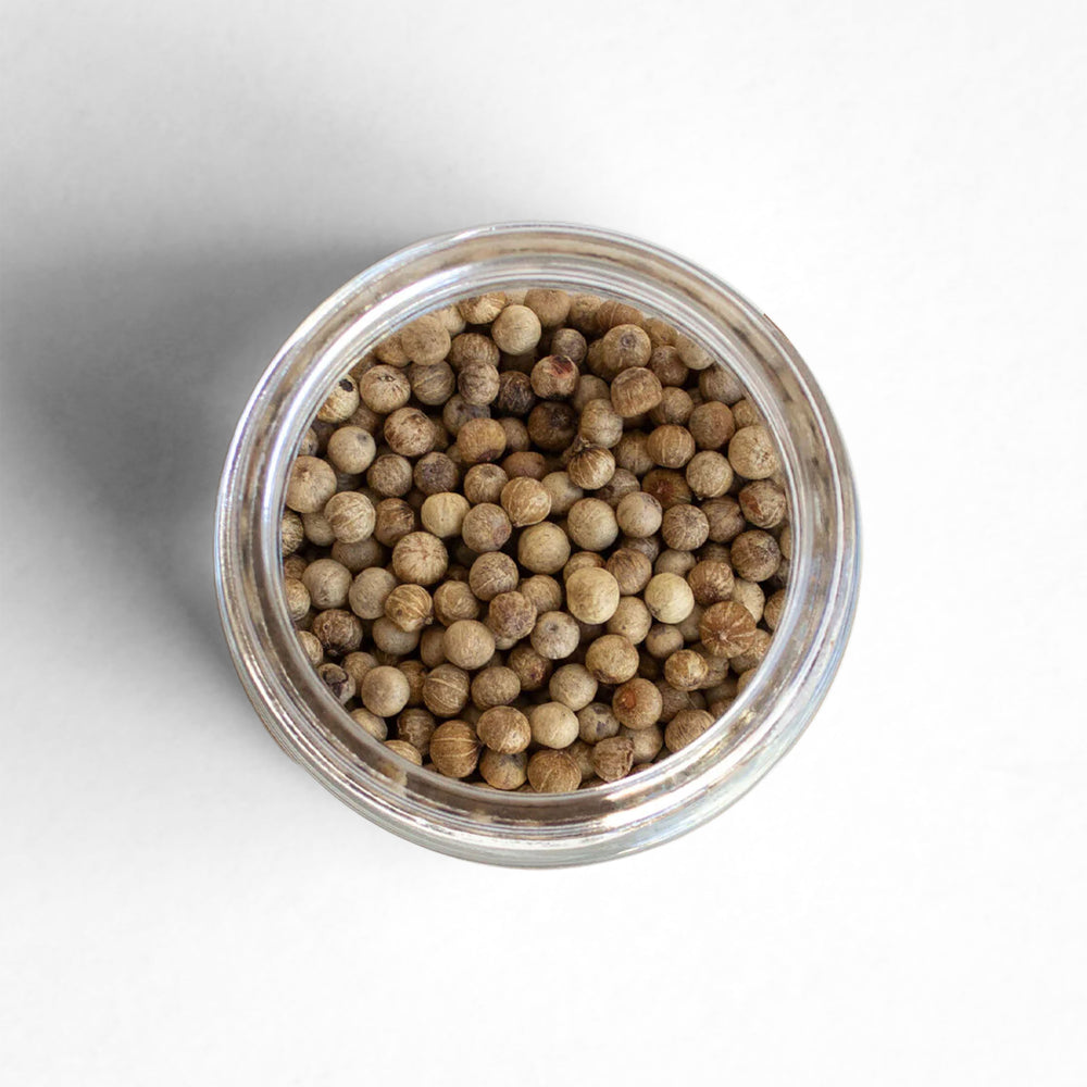 Top-down view of Kampot White Peppercorns