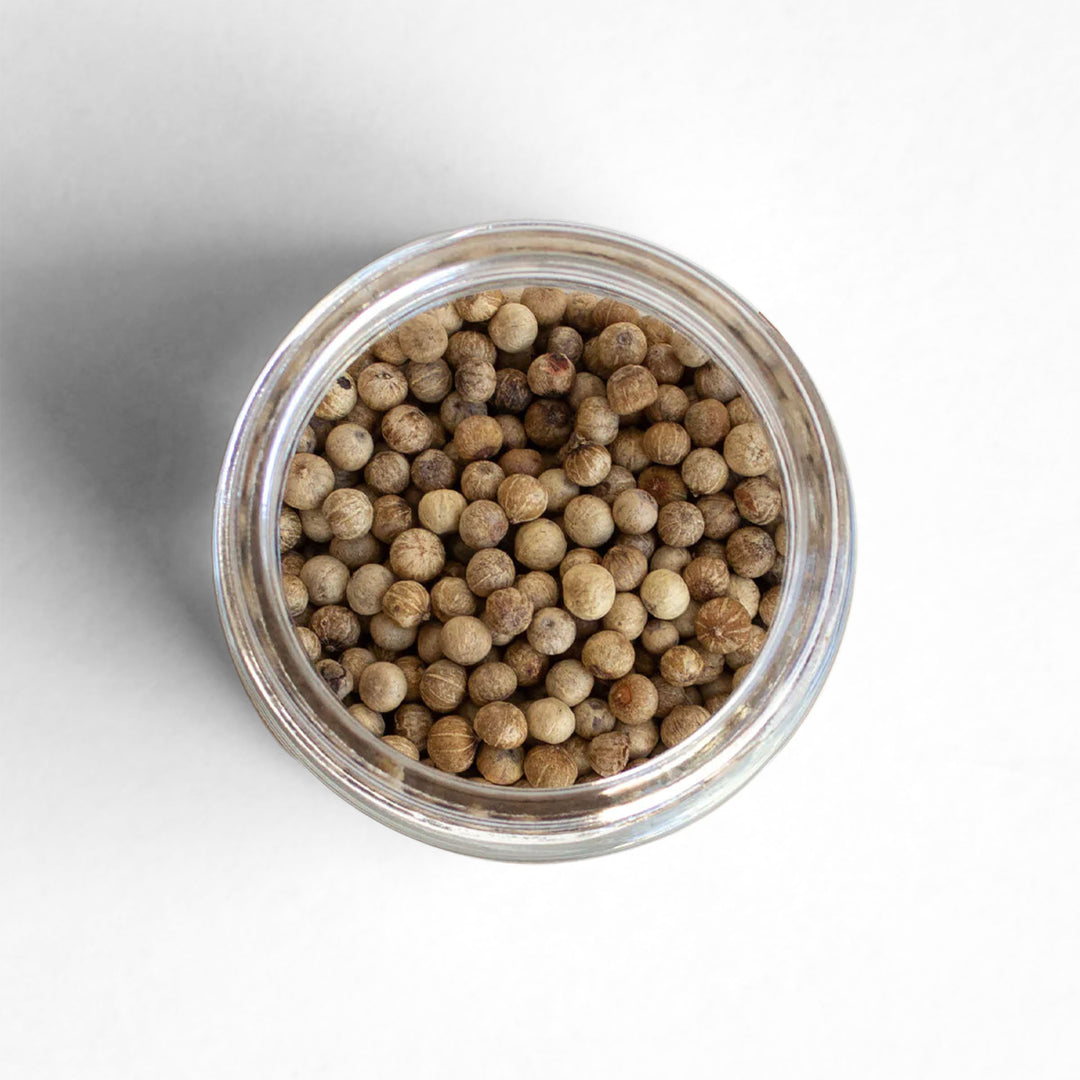 Top-down view of Kampot White Peppercorns