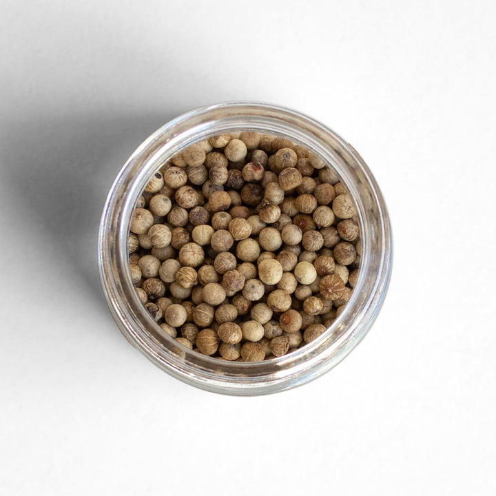 Top-down view of Kampot White Peppercorns