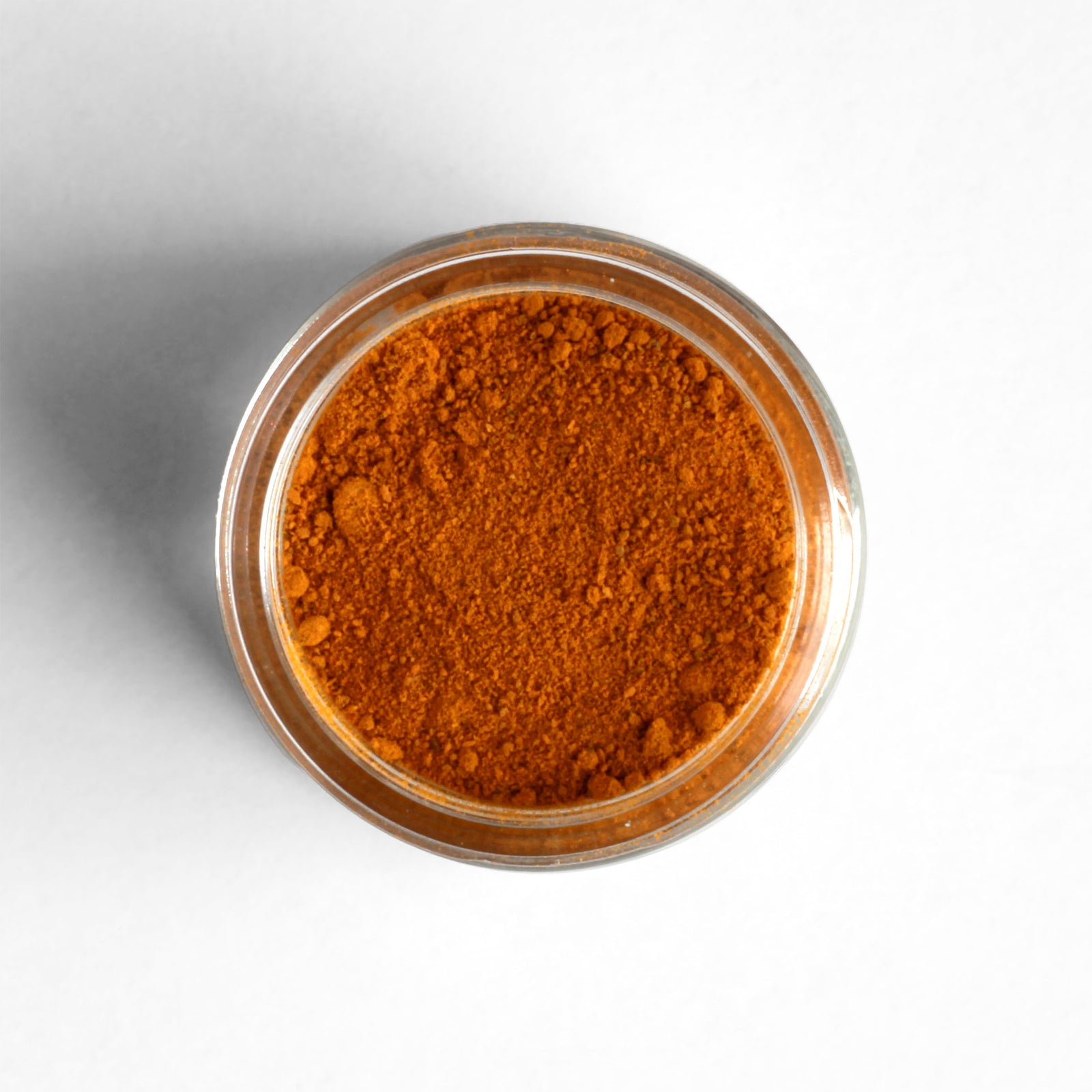 Top-down view of Ground Ethiopian Turmeric: a richly hued spice with a complex flavor profile grown by a woman-owned farming cooperative in Bonga.