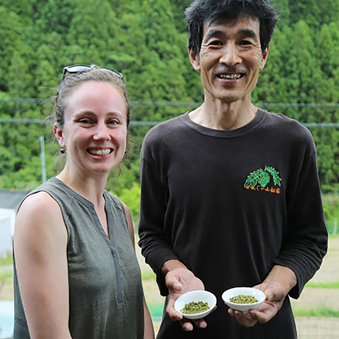 Claire, Curio's founder, with a sourcing partner for Edo Spice, a Curio-exclusive signature blend.
