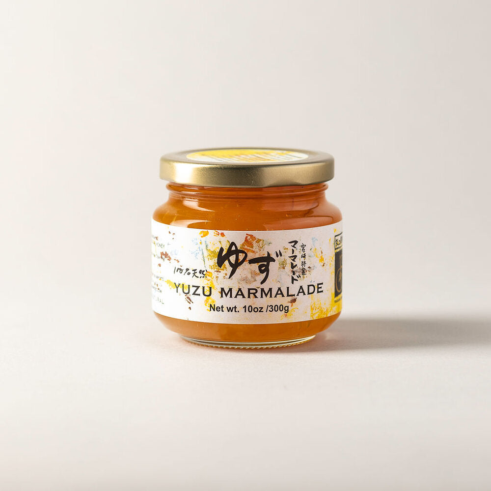 Jar of Yuzu Marmalade with a gold lid.