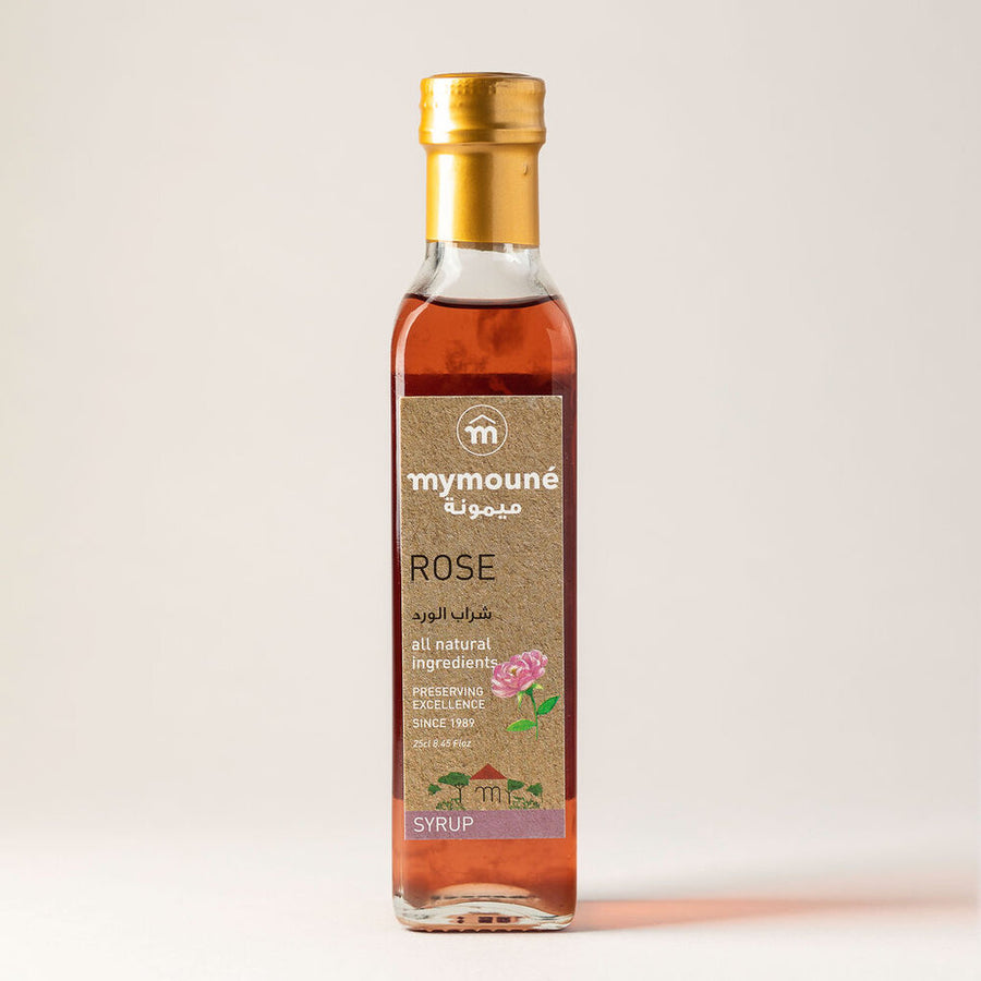 Bottle of Rose Syrup made from the petals of the aromatic Rosa Damascena and sugar.