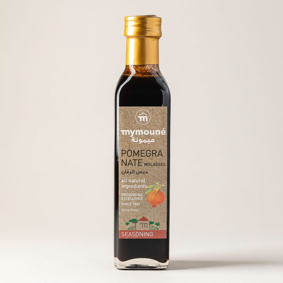 Bottle of Pomegranate Molasses, a sweet, tart, and intensely fragrant syrup that works well in Middle Eastern dishes.