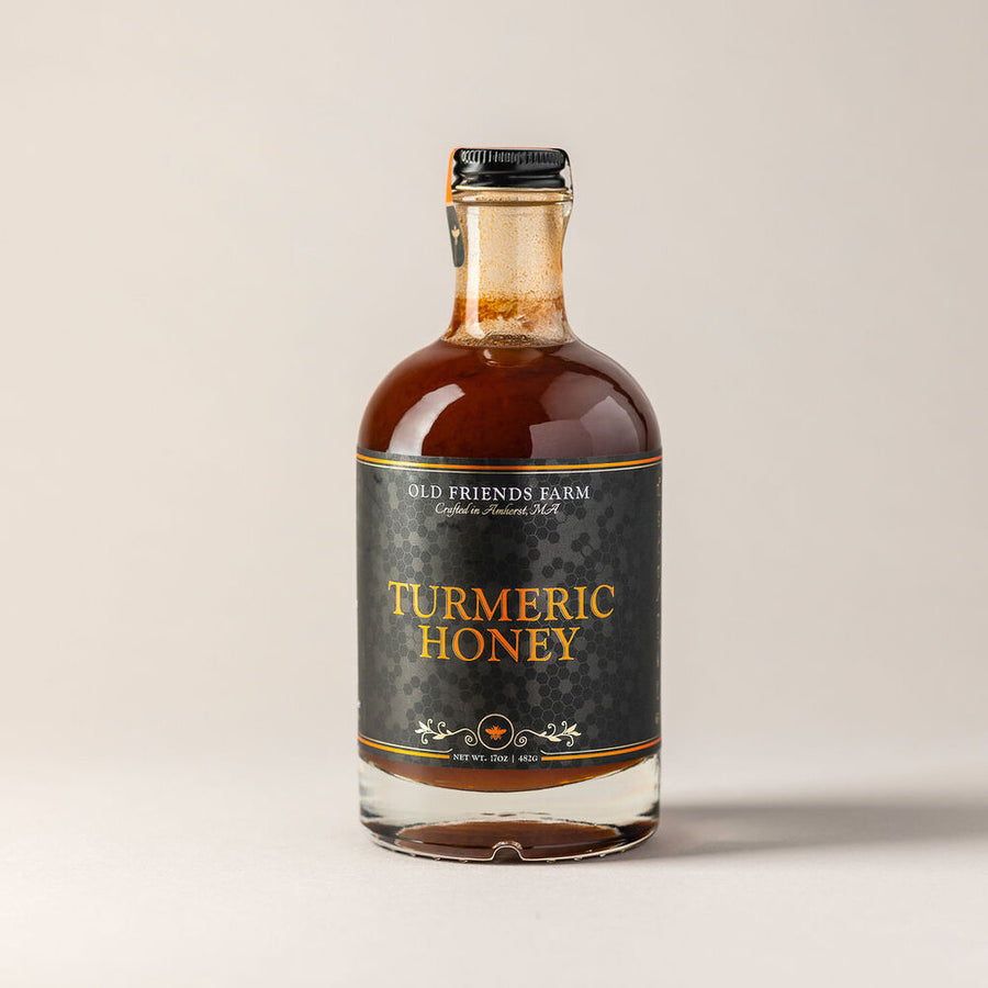 A jar of small batch Turmeric Honey from Old Friends Farm in Amherst, MA.
