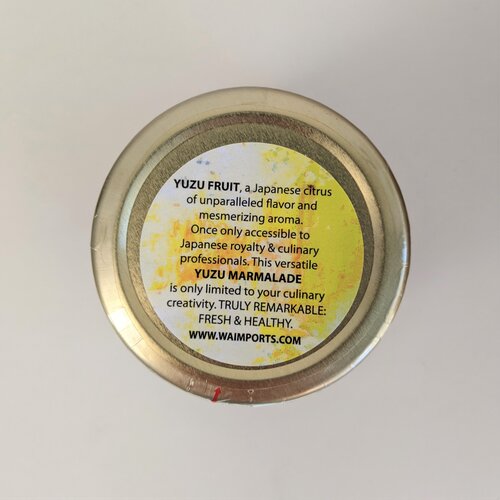 Jar label of Yuzu Marmalade: A Japanese citrus of unparalleled flavor and mesmerizing aroma. Once only accessible to Japanese royalty & culinary professionals. This versatile Yuzu Marmalade is only limited to your culinary creativity.